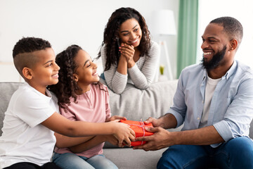 Black kids celebrating father's day, greeting dad