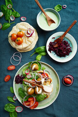 Home made vegan falafel  served with various mezze and pita bread