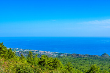 Fototapeta na wymiar View on Mediterranean sea and village from the summit of Tahtali mountain