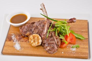 Fototapeta premium meat bbq with vegetables and sauce