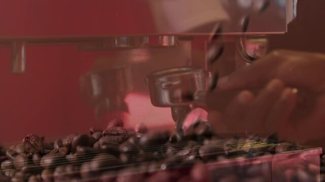 Animation of pouring coffee beans with hands of barista preparing coffee at a cafe