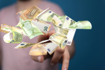 bill euro banknote in hand rain