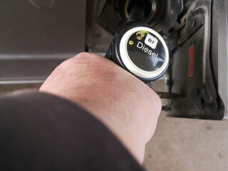 Fototapeta premium refuelling diesel pump diseel refuelling diesel pump diseel