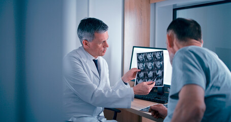 Doctor discussing MRI results with patient