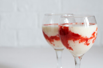 Two glasses of strawberry banana smoothie. Beautiful delicious sweet drink