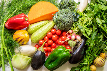 Healthy food clean eating selection: fruit, vegetable, papaya, superfood, leaf vegetable on white background