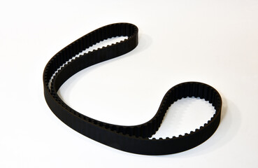The timing belt stands on a white background
