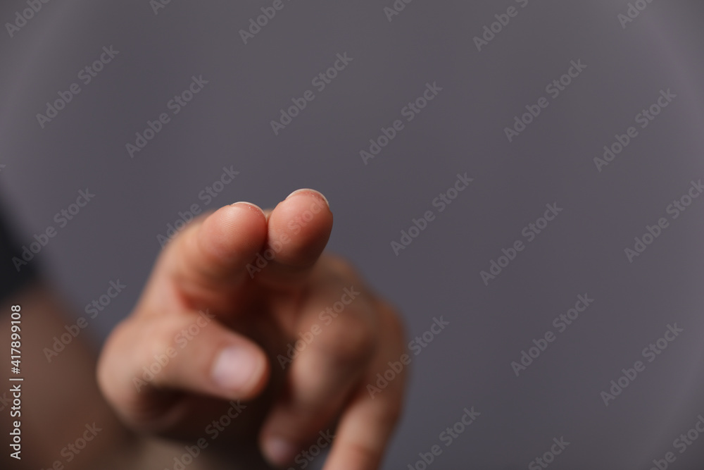 Poster a man hand touching virtual screen, modern background concept , can put your text at the finger, cop