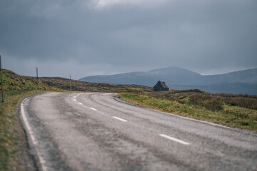 Landscape with winding country roads in Scotland