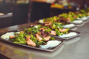 meat salad in the restaurant kitchen, the dish is ready for serving to the client