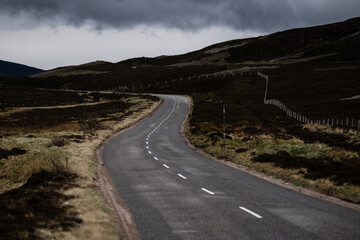Landscape with winding country roads in Scotland