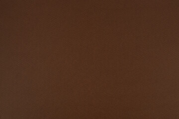 Brown paper background. Pecan brown colour paper texture.