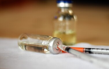 medicine in a vial and syringe