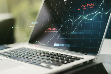 Multi exposure of stats data illustration on modern laptop background, computing and analytics concept