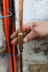 Naklejka premium Grounding of all household electric devices and equipment, Grounding for protection against discharges of static and atmospheric electricity, installation of a copper tube.