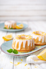 Mini lemon bundt cakes topped with lemon glaze