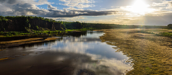 A view over Letaba river before sunset in the Kruger NP in South Africa. - obrazy, fototapety, plakaty