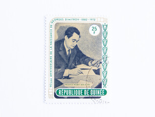 Guinea Republic Postage Stamp. circa 1972. 90th anniversary of Georgi Dimitrov's birth. founder of communist rule and first bulgarian prime minister.
