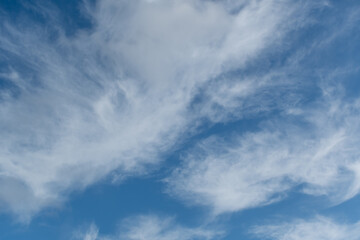 Blue sky and scattered clouds background - 417920119