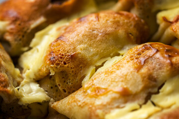 stuffed pancakes drenched in sour cream