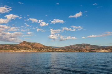 Panoramic view of idyllic summer landscape in the Canada with clear mountain lake background