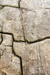 Fractured rock wall rustic background - 417921152