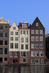 Fototapeta na wymiar Amsterdam Damrak Canal Buildings