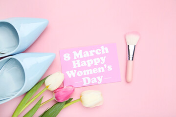 Fototapeta na wymiar Tulip flowers and card with text 8 march Happy Womens Day, blue high heeled shoes and makeup brush on pink background
