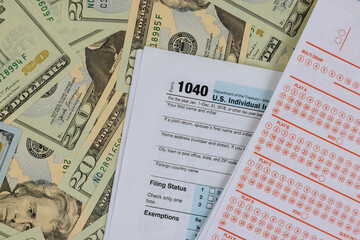 USA tax accounting on 1040 form financial time tax form with payment taxes of win government lottery and US dollar