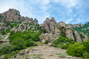 Fototapeta na wymiar Panorama of mountains in Valley of Ghosts. Strange form of rocks caused by centuries of weathering. Shot near Alushta, Crimea