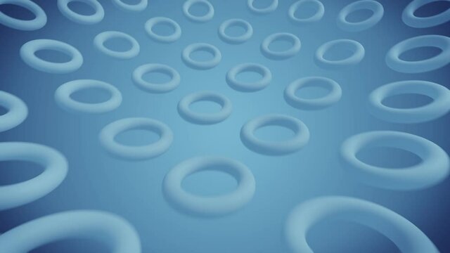 3D animation of geometric shapes. Modern blue background with polygon. Video for business. loop animation motion graphics. 4k rows and sphere of torus rings in a rainbow in a circular formation
