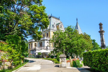Massandra Palace as it looks from main road in park. It was founded in 1881 by Prince Vorontsov. Now it's one of popular tourist places near Yalta, Crimea