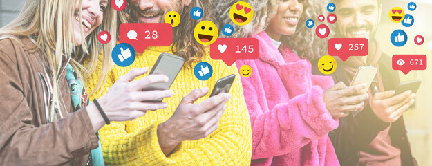 Social media concept with group of young people using smartphones with icons and emoticons that pops from cell phones screens.