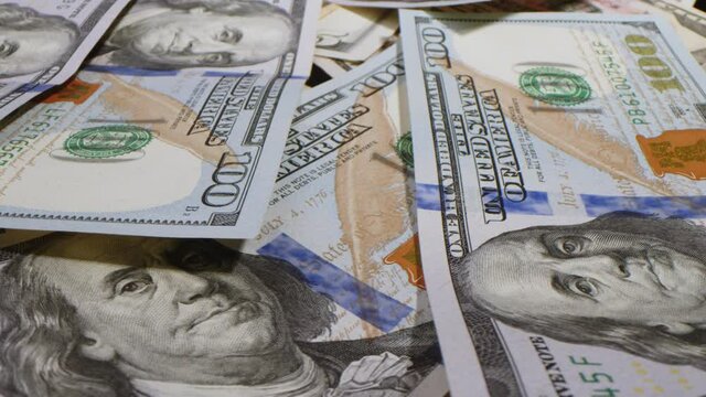 Macro money bills dollars 4K. Dirhams, crown, rupees, pounds, ruble, Swiss francs, zloty, Euro. Banknotes of different countries and denominations