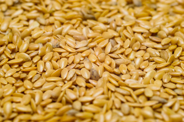 Golden flaxseed or linseed, close up, healthy eating