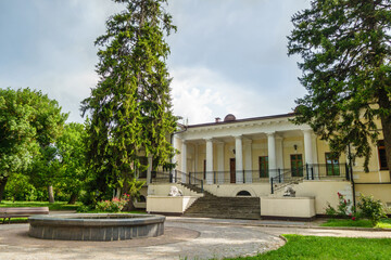 Fototapeta na wymiar Vorontsov house, historical building in urban park Salgirka, Simferopol, Crimea. Built in 1826 as mansion of count Vorontsov, now it's scientist center