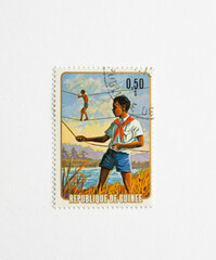  Guinea Republic Postage Stamp. circa 1974. Boy scouts use walkie-talkies