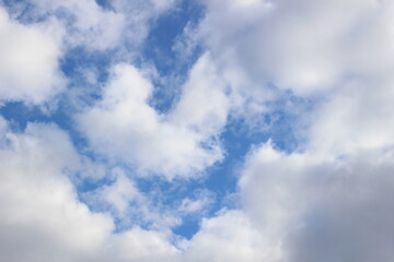 Deep blue sky with beautiful soft clouds