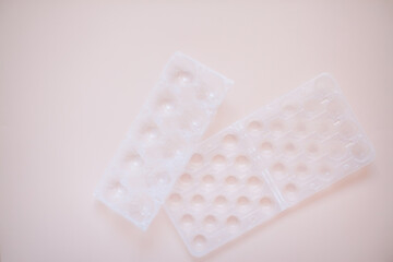 Egg packaging: recyclable and plastic. Waste sorting. Ecological problems. High quality photo