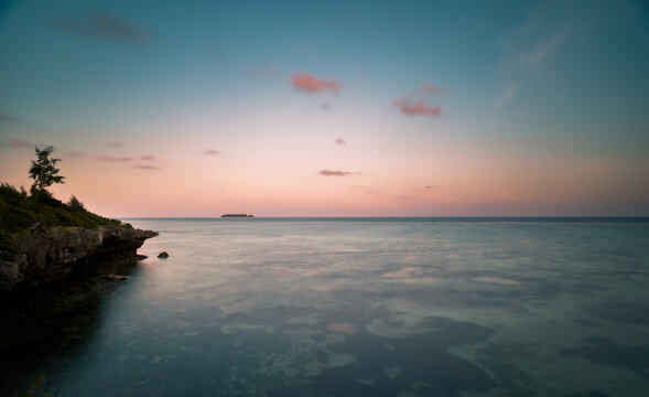 beautiful sunset over the sea. tropical mnemba island in the background. Zanzibar, Tanzania