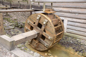 Water Wheel or Watermill Turbine Grinding, Turning, and Generating Power