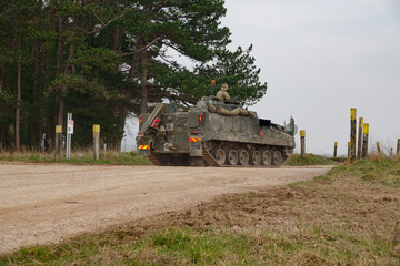 Fototapeta premium british army FV512 warrior MRV tank in action on Salisbury Plain, Wiltshire