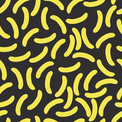 Seamless patterns with yellow oblong sticks on a dark gray background for fashion prints, textiles, bed linen, wrapping paper. 