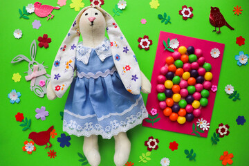 Easter card for children. easter egg made of multicolored candies and place for text 