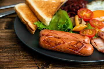 Rustical breakfast eggs, sausages, vegetables. Selective focus