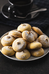Cookies with chocolate cream. Sweet biscuits on plate.
