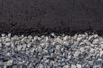 New motor road. Paved bituminous asphalt based on gravel. Road layers. Road composition