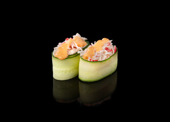 Gunkan maki sushi with crab, black background
