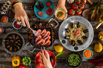 Seafood pasta and paella with mussels. 
