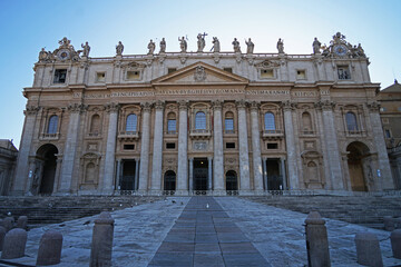 Fototapeta na wymiar World's largest The Papal Basilica of Saint Peter front view with balcony before sunset, Vatican